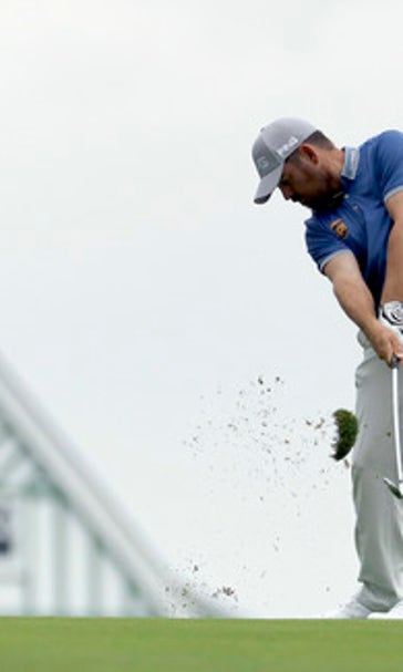 The Latest: Landry falls out of lead at US Open